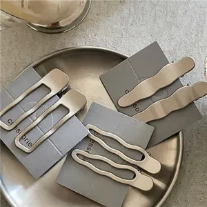 Lot de pinces à cheveux argentées minimalistes avec motifs géométriques et vagues épurées