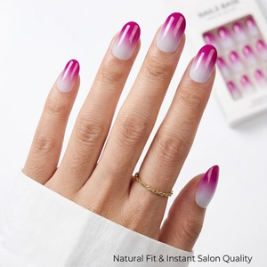 Close-up of magenta gradient oval press-on nails with natural fit and glossy finish