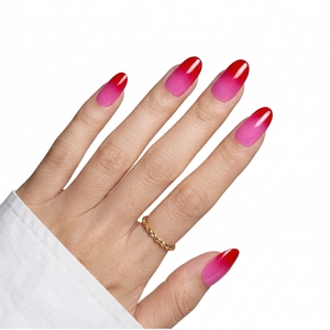 Macro view of oval gradient press-on nails transitioning from rose pink to deep red color