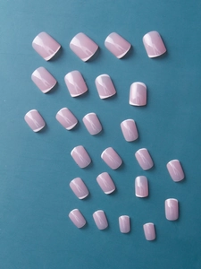 Detailed set of 24 light purple French press-on nails with white tips on blue background
