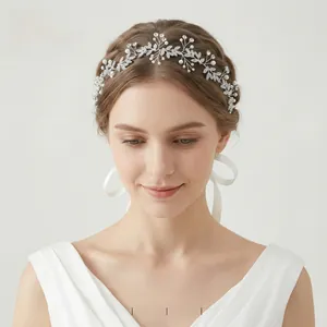 Detailed macro view of adjustable silver alloy vine headband with pearls and rhinestones