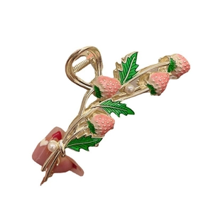 Elegant strawberry metal hair claw clip with pink fruit and pearls on gold branches