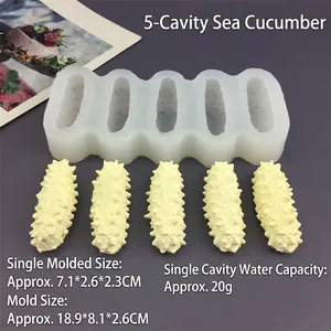 Detailed view of a 5-cavity sea cucumber silicone mold for DIY baking and crafts
