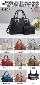 Close-up of textured faux leather handbag set including a large tote and zipper pouch