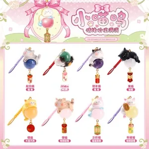Detail of 8 cute cat charms including orange and calico designs with lucky talismans
