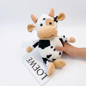 Cute black and white plush cow crossbody bag with soft horns and embroidered face details