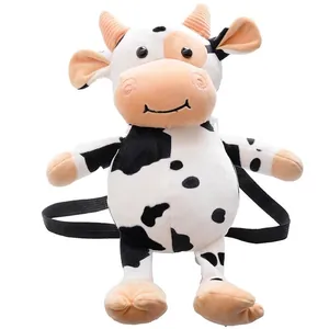 Cute cow plush backpack with black and white spots and adjustable straps for kids