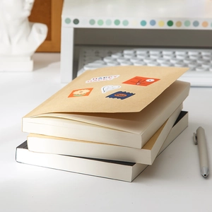 Three-pack minimalist kraft paper notebooks with cute stickers and thick beige pages