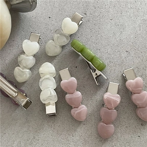 Elegant marble texture heart hair clips in soft pink, beige, and green for women