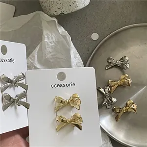 Barrettes à cheveux nœud papillon en métal doré et argenté sur cartes blanches