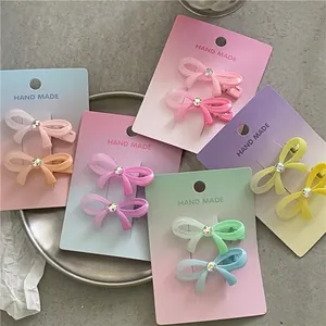 Lot de barrettes nœuds en résine dégradée avec strass et pinces bec de canard en métal