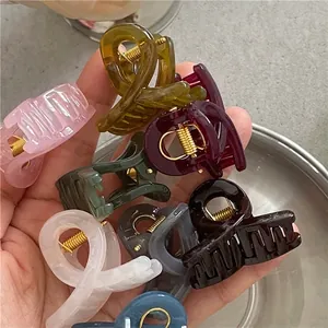 Jelly texture colorful mini shark hair claws in assorted shades for girls' ponytails