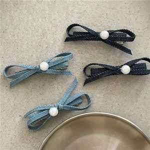 Denim bow hair clip set with faux pearls and metal duckbill pins in light and dark blue