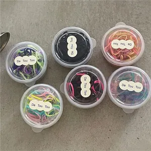 Set di elastici per capelli per bambine in sei scatole di plastica trasparente