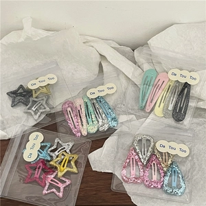 Lot de barrettes à cheveux pailletées avec formes d'étoiles et de cœurs colorés