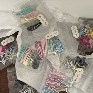 Set de barrettes colorées à paillettes en forme d'étoile et goutte aux tons macaron