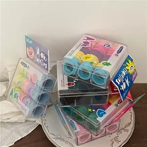 Mixed macaron color hair ties set for kids in a transparent plastic storage box