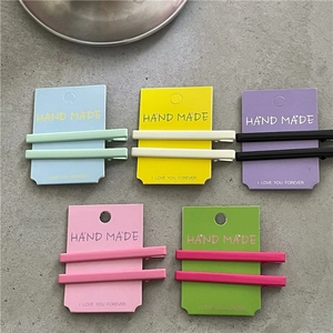 Lot de cinq paires de barrettes à cheveux mates aux tons macarons, vert et rose