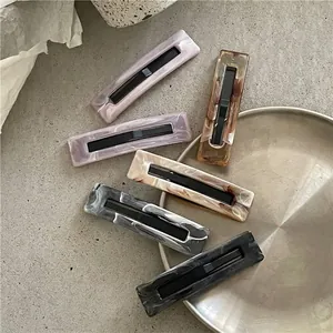 Set of rectangle marble texture acetate hair clips in assorted pastel and neutral colors