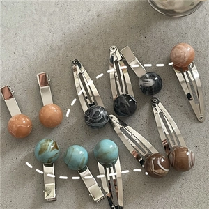 Detailed set of 11 hair clips with marble texture resin spheres on silver alloy bases