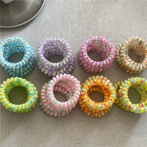 Detailed view of 8pcs colorful floral print spiral telephone wire hair coils set