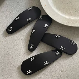 Pince à Cheveux BB Goutte d'Eau en Tissu Noir Avec Décorations de Nœud en Métal Argenté Pince Latérale Élégante pour Femme