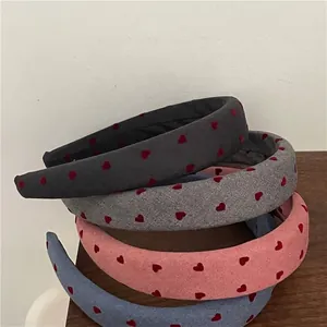Set of four padded headbands with red heart prints in black, grey, pink and denim blue
