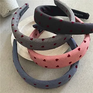 Thickened padded headbands with red heart prints in various colors and handmade label