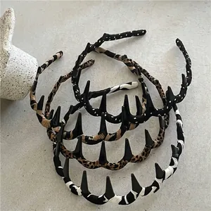 Retro leopard and polka dot wide tooth headbands in assorted fabric prints