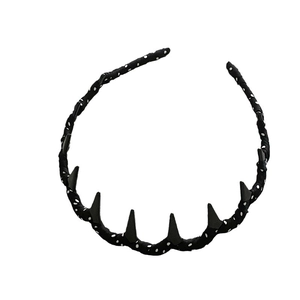 Retro black polka dot fabric headband featuring unique punk style decorative spikes