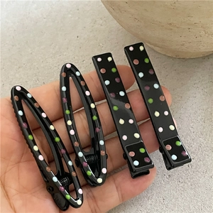 Cute black hair clips set with colorful polka dots including drop and rectangle shapes