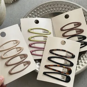 16-piece set of leopard print and solid color oval BB hair clips on display cards