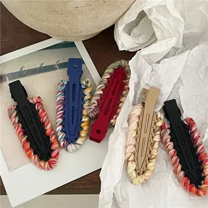 Colorful knitted drop-shaped hair clips in various colors for women and girls