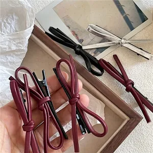 Élégantes Barrettes à Nœud en Cuir PU Minimalistes Pinces à Bec de Canard en Similicuir Accessoires de Coiffure pour Femmes Filles