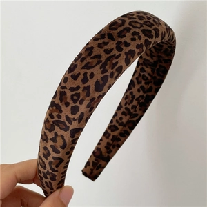 Close-up of thick sponge leopard print headband with soft vintage velvet texture
