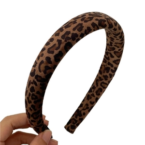 Classic leopard print wide headband with thick padded design and vintage fabric texture