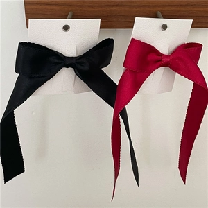 Fairy style long ribbon bow hair clips in black and red silk with serrated edges