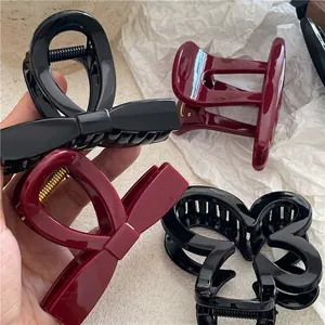 Elegante molletta per capelli a fiori e fiocco in resina nera e bordeaux