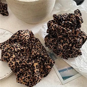 Vintage leopard print scrunchies in chic chiffon fabric for stylish ponytail hairstyles