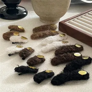 Retro plush fabric geometric hair clips set in cream and camel with gold metal buckle