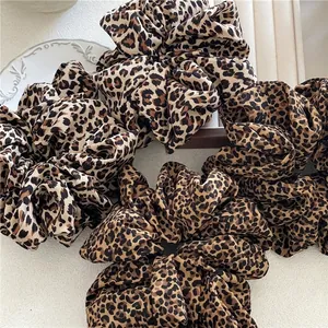 Set of large leopard print scrunchies in chiffon fabric for women stylish ponytail holders