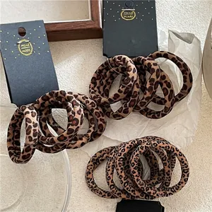 Five-piece leopard print scrunchie set in elastic towel fabric with handmade card
