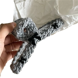 Lazy style grey knitted cross hair claw clip decorated with small black velvet bows