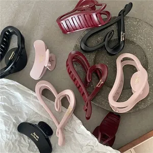 Elegant matte heart and rectangular hair claws in black, burgundy and pink colors