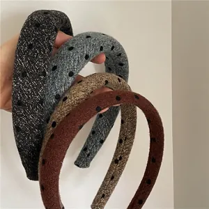 Set of thick wool knitted headbands with black polka dots in grey, khaki, and brown colors