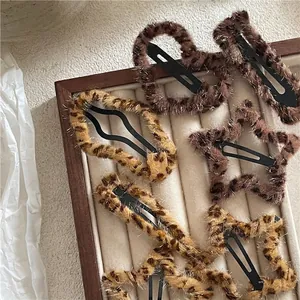 Plush leopard print hair clips in geometric shapes for autumn winter vintage styles