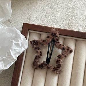 Star-shaped faux fur leopard print hair clip with soft plush texture and metal BB clasp