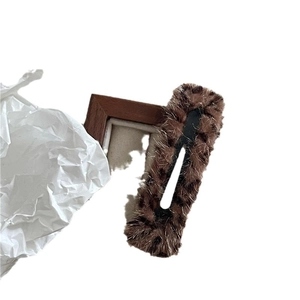 Retro plush leopard print rectangular hair clip with soft brown faux fur texture