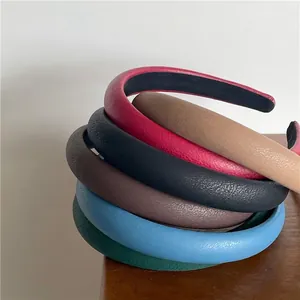 Retro faux lychee leather padded headbands in various colors with non-slip lining