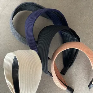 Vertical striped knit headbands in five colors with non-slip plastic inner teeth